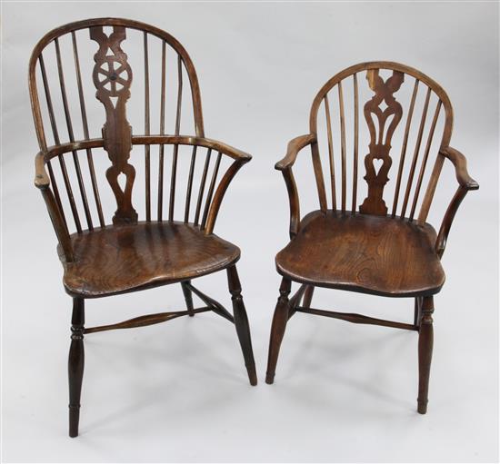 A 19th century elm seat Windsor wheelback armchair & a similar chair